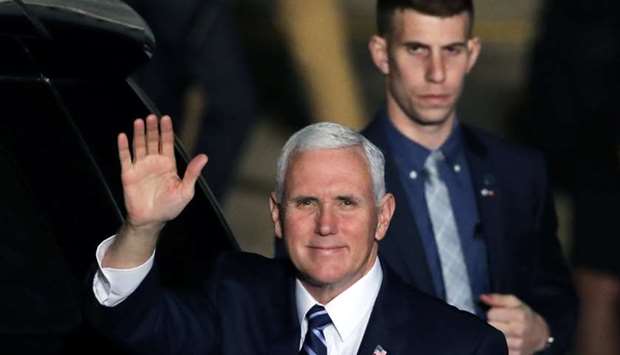US Vice President Mike Pence waves upon their arrival at Ben Gurion international Airport in Lod, near Tel Aviv, Israel.
