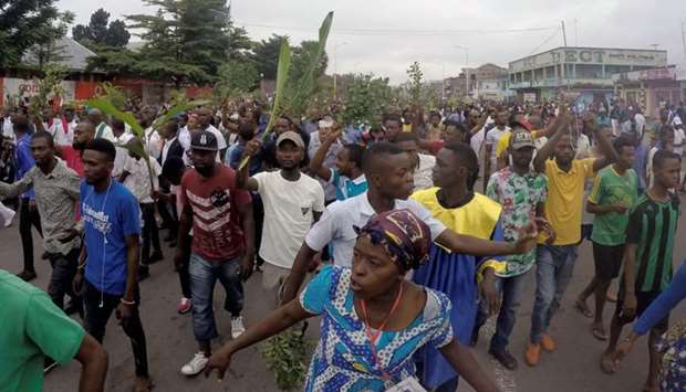 Demonstrators chant slogans during a protest against President Joseph Kabila, organized by the Catholic church in Kinshasa, Democratic Republic of Congo.