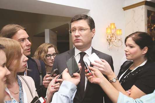 Russiau2019s Energy Minister Alexander Novak speaks with journalists during the 7th Meeting of the Joint Ministerial Monitoring Committee in Muscat yesterday. The oil market still isnu2019t fully re-balanced, though the ministers from Opec and allied producers agreed yesterday in Muscat that their output-cuts agreement is working, Novak said.