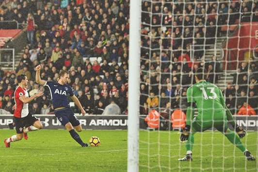 Tottenham Hotspuru2019s Harry Kane (second from left) takes a shot at the goal during the English Premier League match against Southampton in Southampton, England, yesterday. (AFP)