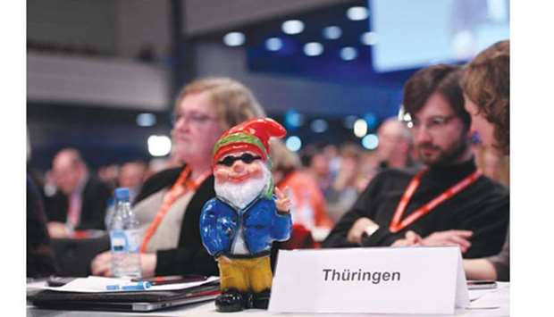 A garden gnome stands on the desk of SPD delegates from Thuringia during the partyu2019s extraordinary congress in Bonn.