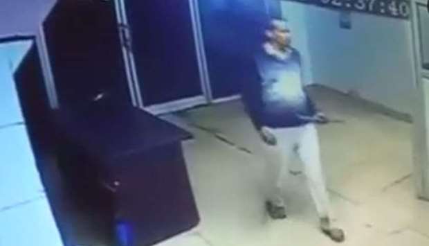 Image grab from a CCTV footage that shows Naresh Dhankar wielding an iron rod