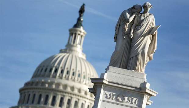 The figures of Grief and History stand on top of the Peace Statue near the U.S. Capitol after President Donald Trump and the U.S. Congress failed to reach a deal on funding for federal agencies in Washington