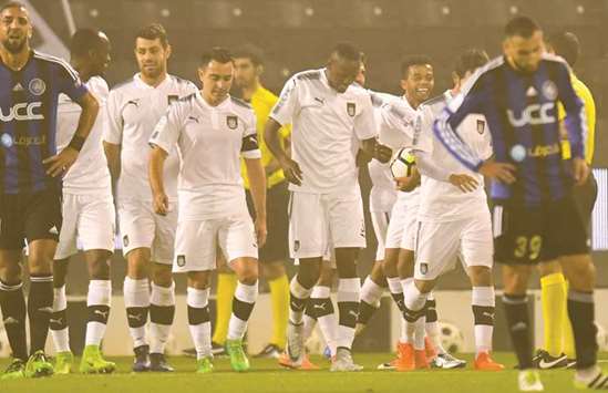 Al Sadd (in white) beat Al Sailiya (in black and blue) 6-0.