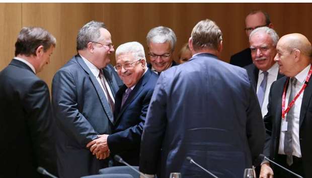 Palestinian President Mahmoud Abbas (C) attend a meeting with EU foreign ministers in Brussels, Belgium.