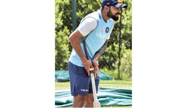 Indian Captain Virat Kohli checks his bat during a training session in Johannesburg. (AFP)