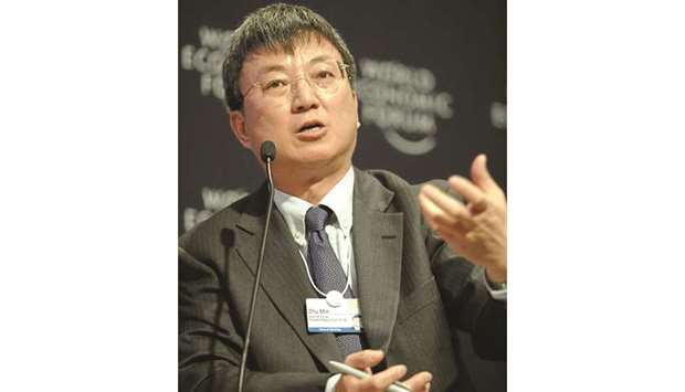 Zhu: China would continue to reform its financial sector and gradually open its capital account in coming years.