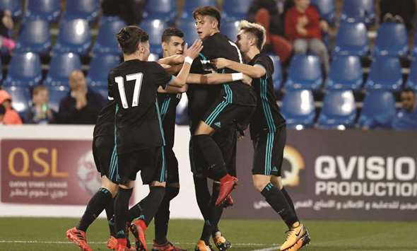 Real Madrid players celebrate Javier Domniguezu2019s goal during the Al Kass International Cup match against Aspire Football Dreams yesterday. PICTURE: Jayaram
