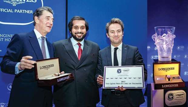 Qatar Racing and Equestrian Club General Manager Nasser bin Sherida al-Kaabi (centre) receiving the award along with France Galop President Edouard de Rothschild (left) and General Manager Olivier Delloye in London yesterday.