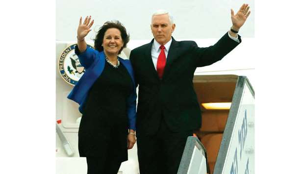 US Vice President Mike Pence and his wife Karen wave as they board an airplane ahead of their departure from Ben Gurion International airport, near the Israeli city of Tel Aviv, yesterday.