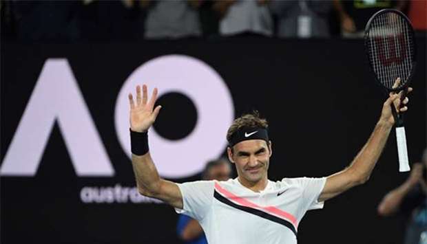 Roger Federer celebrates beating Tomas Berdych in Melbourne on Wednesday.