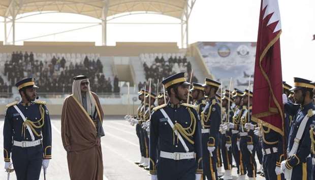 His Highness the Emir Sheikh Tamim bin Hamad al-Thani reviewing a guard of honour staged by the graduates of Al Zaeem Mohamed Bin Abdullah Al Attiyah Air College 