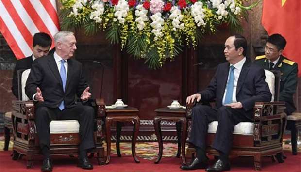 US Defense Secretary James Mattis (left) meets with Vietnamese President Tran Dai Quang at the presidential palace in Hanoi on Thursday.