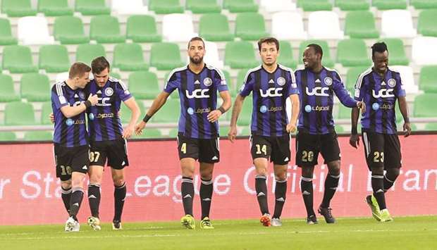 Al Sailiyau2019s Wagner Ribeiro (second left) celebrates with teammates after scoring against Al Markhiya during the QNB Stars League match at Al Ahli Stadium yesterday.