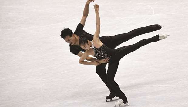 Ryom Tae-Ok and Kim Ju-Sik of North Korea perform during the ISU Four Continents figure skating championships in Taipei yesterday. (AFP)