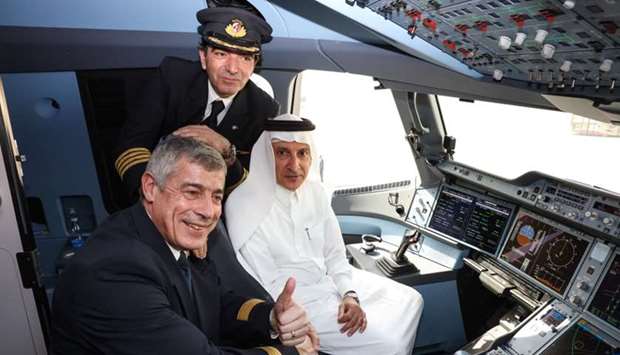 Al-Baker at the cockpit with the pilots of the Airbus A350-1000 test aircraft, which landed at the Doha International Airport on Saturday as part of a special demonstration tour by the European planemaker.