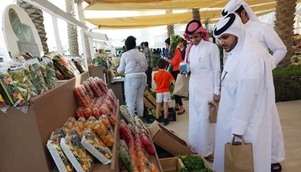 Members of the community visit the Torba Farmers Market in Qatar Foundationu2019s Education City.