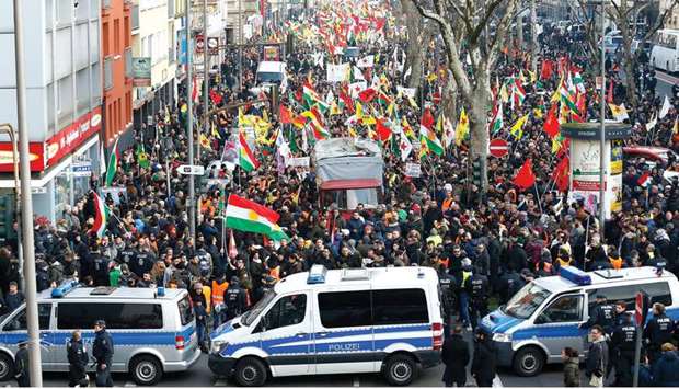 German police block the march in Cologne of pro-Kurdish people after flags with the picture of imprisoned Kurdish rebel leader Abdullah Ocalan were used by the protesters.