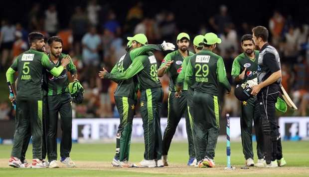 Pakistani players celebrate winning the third Twenty20 international cricket match between New Zealand and Pakistan at Bay Oval in Mount Maunganui.