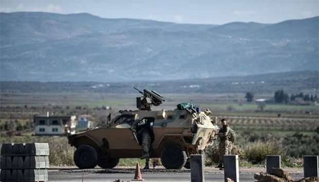 A Turkish armed military vehicle is seen at Hassa near Hatay, southern Turkey. on Sunday.