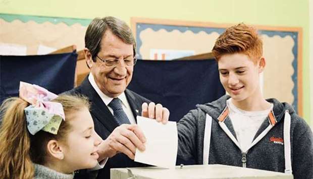 Cypriot President Nicos Anastasiades casting his vote in the presidential election at a polling station in Limassol on Sunday.