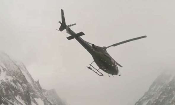 This image taken from social media shows the Pakistani military helicopter leaving the K2 base camp with the Polish team.