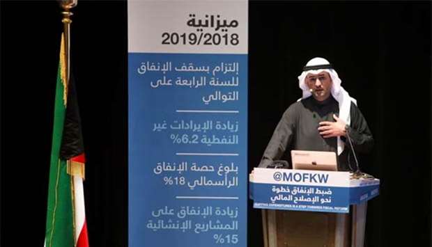 Kuwaiti Finance Minister Nayef al-Hajraf speaks in Kuwait City on Monday.