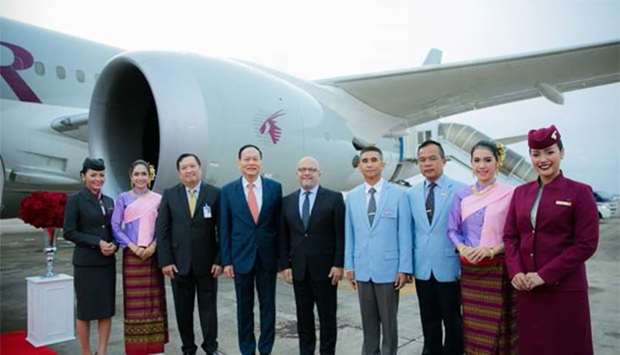 Dignitaries and officials are pictured upon arrival of the Qatar Airways flight at Pattaya.