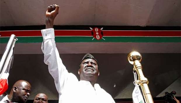 Kenyan opposition leader Raila Odinga of the National Super Alliance (NASA) raises his fist before taking a symbolic presidential oath of office in Nairobi on Tuesday.
