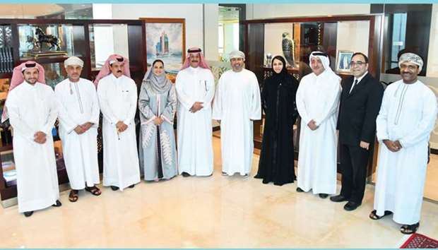 Sheikh Abdullah (fifth left) with NBO board members and senior management during their first board meeting of 2018 at the Commercial Bank Plaza in Doha.
