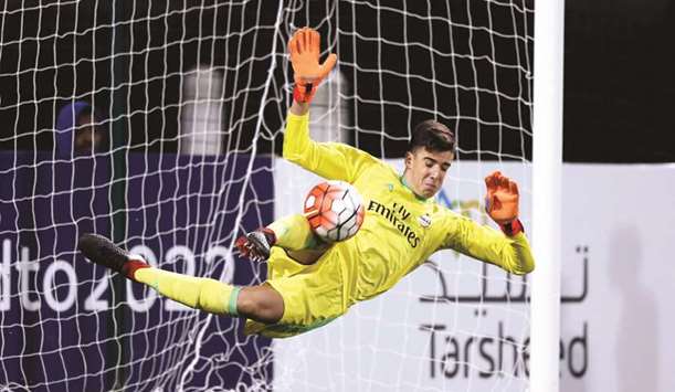 AC Milan goalkeeper Niccolo Zanellato makes a save during the match against Aspire Academy yesterday.