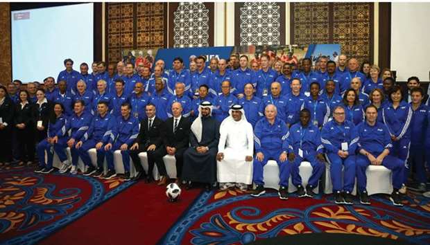 QFA secretary-general Mansour al-Ansari, FIFA technical director Steven Martens and QFA Development Department Director Fahd Thani pose for a photo with all the participants of the FIFA Technical Expertsu2019 Workshop yesterday.