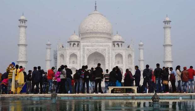 Crowds gather to visit the Taj Mahal in Agra