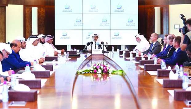 Al-Kaabi and senior QP, Qatargas and affiliates' officials at the press conference at Qatar Petroleum