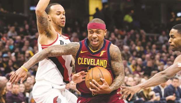 Shabazz Napier of the Portland Trail Blazers tries to stop Cleveland Cavaliersu2019 Isaiah Thomas (right) during the first half at Quicken Loans Arena in Cleveland, Ohio. (AFP)