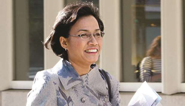 Indrawati: The government has to strike a balance in chasing its revenue goals.