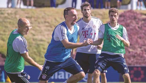 Bayern Munich players train at Aspire Zoneu2019s outdoor football pitch in Doha yesterday.