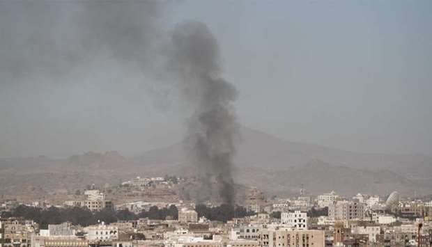 Smoke rises after an airstrike in  Yemen