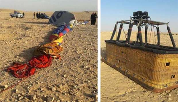 The remains of a hot air balloon are seen on the ground near the ancient city of Luxor after a fatal crash on Friday. At right, the basket of the balloon.