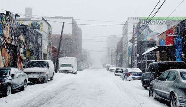 Snow covers the streets of Brooklyn during a massive winter storm in New York City.
