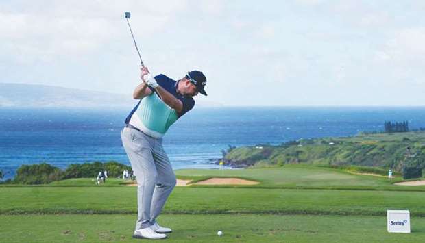 Marc Leishman of Australia plays his shot from the 11th tee during the first round of the Tournament of Champions at Kapalua Golf Club in Lahaina, Hawaii, on Thursday. (AFP)