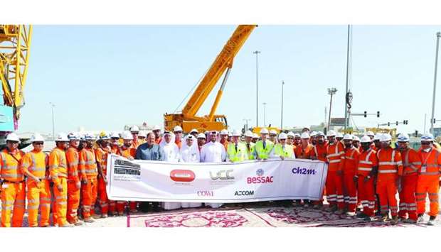 Employees of contracting firms and Ashghal officials at the completion of the tunnelling of the western main tank sewer