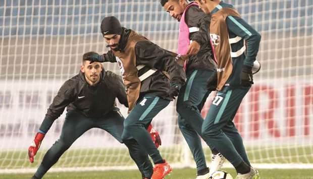 Qatar under-23 players train in Changzhou, China yesterday.