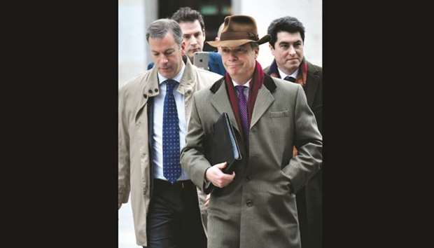 Former leader of UK Independence Party Nigel Farage arrives ahead of a meeting with European Commission member in charge of Brexit negotiations with Britain at the EU headquarters in Brussels yesterday.
