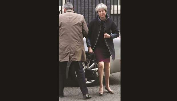 Prime Minister Theresa May arrives at 10 Downing Street in London yesterday ahead of the Cabinet reshuffle.