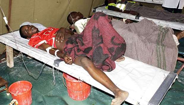 Cholera patients rest under a tent at Kanyama clinic in Zambia's capital Lusaka. File picture courtesy: The East African
