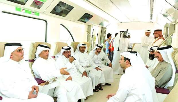 HE the Prime Minister and Interior Minister Sheikh Abdullah bin Nasser bin Khalifa al-Thani is joined by key officials during a test ride of one of the trains of Doha Metro project.