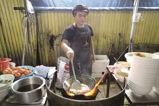 STREET FOOD: In Bangkok, open-air eateries have come under fire from the government amid hygiene concerns, but protesters have ensured they continue to thrive in the city.