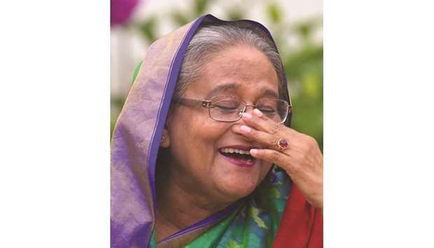 Bangladesh Prime Minister Sheikh Hasina gestures during a press conference in Dhaka yesterday.