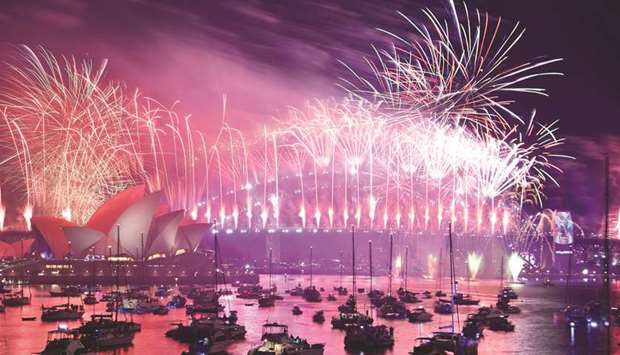 New Yearu2019s Eve fireworks erupt over Sydneyu2019s iconic Harbour Bridge and Opera House during the fireworks show yesterday.